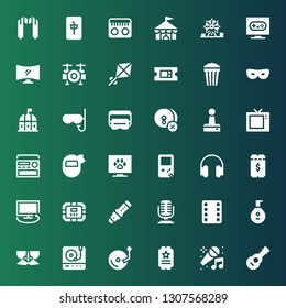 entertainment icon set. Collection of 36 filled entertainment icons included Guitar, Karaoke, Ticket, Vinyl, Turntable, Mask, Lute, Film, Microphone, Flute, Poker table, Tv, Headphones