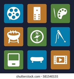 Entertainment icons set. Set of 9 Entertainment filled icons such as movie tape, palette, domino, skate, laptop, barbecue, sewing