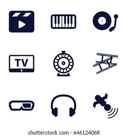 Entertainment icons set. set of 9 entertainment filled icons such as tv, roulette, movie clapper, satellite, piano, gramophone, headset, camera tape
