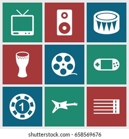 Entertainment icons set. set of 9 entertainment filled icons such as 1 casino chip, portable console, tv, guitar strings, drum, loudspeaker, guitar