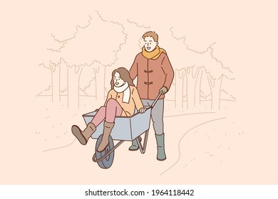 Entertainment for romantic couple concept. Man cartoon character boyfriend or husband cartoon character carrying riding woman In wheelbarrow collecting autumn leaves from garden together illustration