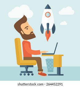 An enthusiastic, eager hipster Caucasian young man with beard sitting in front of his laptop browsing, researching  and planning a metaphor for new business. On-line start up business concept. A svg