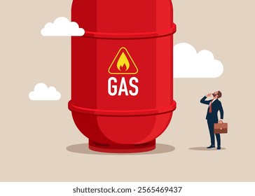 Entrepreneur thinking with big gas cylinder. Think big, aspiration to win and success in business. Commodities price for trading and investment. Gas tank, Used for  various industries, consumable.