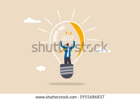 Entrepreneurship, curiosity and creativity to create new idea, motivation to success or problem solving concept, smart businessman go inside light bulb to fix or invent new idea light up bright.