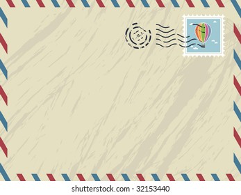 envelope with airmail stripes, post mark and stamp.