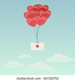 Envelope with bunch of heart balloons