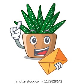 With envelope character small zebra cactus plant on pot