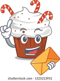 With envelope christmas cupcake served on cartoon plate