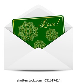 Envelope with a green postcard with yellow mandalas printed and sign "Love"