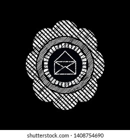 envelope icon drawn on a blackboard