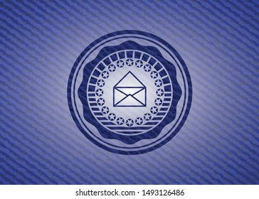 envelope icon inside badge with jean texture