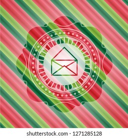 envelope icon inside christmas badge.