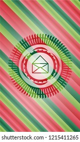 envelope icon inside christmas colors style badge.