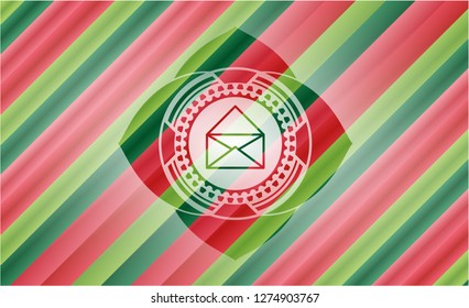 envelope icon inside christmas colors style badge.