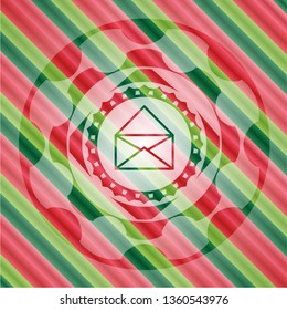 envelope icon inside christmas colors style emblem.