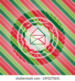 envelope icon inside christmas emblem.