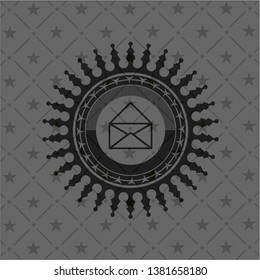 envelope icon inside dark emblem