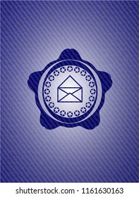 envelope icon inside denim background