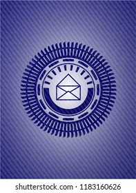 envelope icon inside denim background