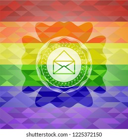 envelope icon inside emblem on mosaic background with the colors of the LGBT flag