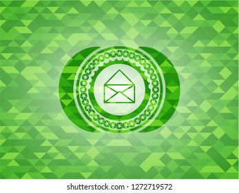 envelope icon inside green emblem with mosaic background