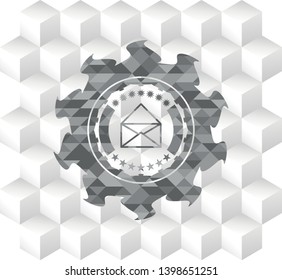 envelope icon inside grey badge with geometric cube white background