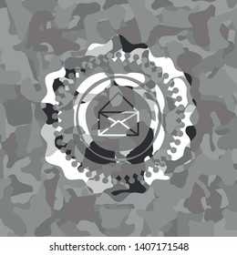 envelope icon inside grey camo emblem
