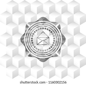 envelope icon inside grey icon or emblem with geometric cube white background