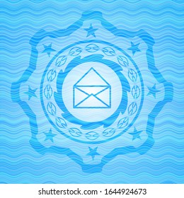 envelope icon inside light blue water style emblem.