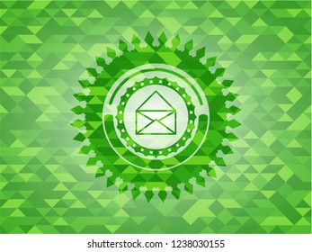 envelope icon inside realistic green emblem. Mosaic background
