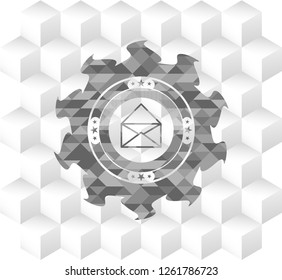 envelope icon inside realistic grey emblem with geometric cube white background