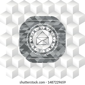envelope icon inside realistic grey emblem with cube white background