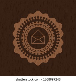 envelope icon inside retro wood emblem