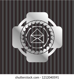 envelope icon inside silvery emblem