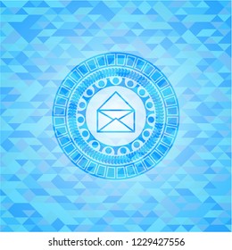 envelope icon inside sky blue mosaic emblem