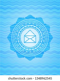 envelope icon inside sky blue water badge background.