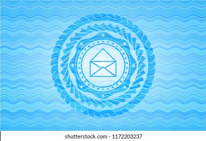 envelope icon inside water concept badge.