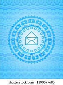 envelope icon inside water concept style badge.