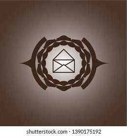 envelope icon inside wood emblem