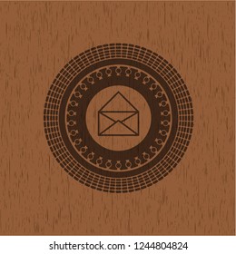 envelope icon inside wooden emblem. Vintage.
