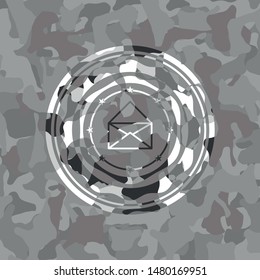 envelope icon on grey camouflaged texture
