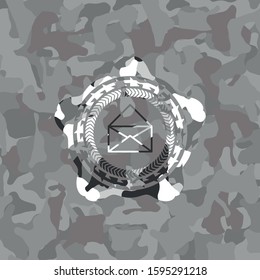 envelope icon on grey camouflaged texture