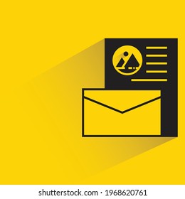 envelope and letter with label shadow on yellow background