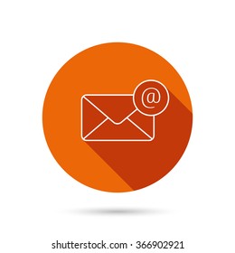 Envelope mail icon. Email message with AT sign. Internet letter symbol. Round orange web button with shadow.
