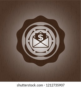 envelope with paper with money symbol inside icon inside wooden emblem. Vintage.