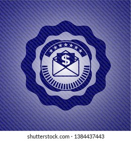 envelope with paper with money symbol inside icon inside jean or denim emblem or badge background