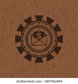 envelope with paper with money symbol inside icon inside vintage wood emblem