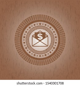 envelope with paper with money symbol inside icon inside retro wood emblem