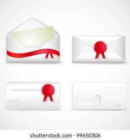 Envelope with red ribbons and stamp isolated on white