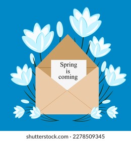 Envelope with snowdrops flowers and card with inscription spring is coming. 